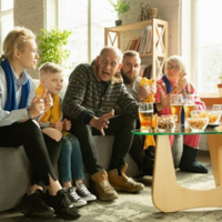 Family of different ages all sitting together